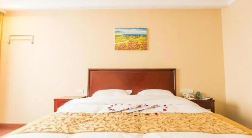 Bed in GreenTree Inn Taizhou New District Hospital of Renmin Hospital Mingliu Express Hotel