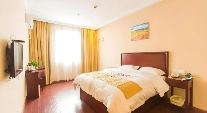 Bed in GreenTree Inn Taizhou New District Hospital of Renmin Hospital Mingliu Express Hotel