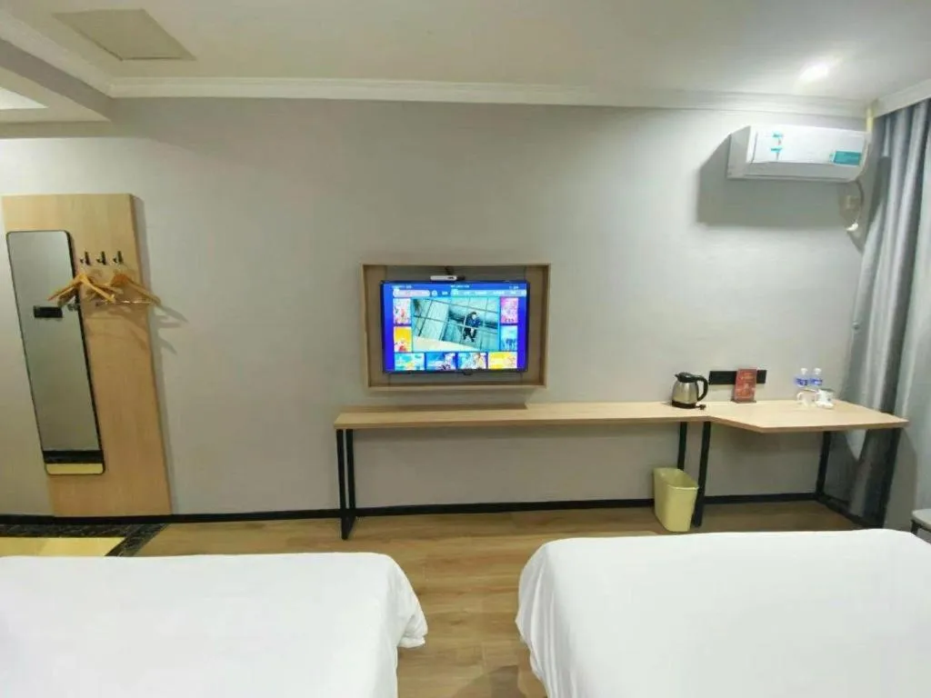 Bed in GreenTree Inn Taizhou New District Hospital of Renmin Hospital Mingliu Express Hotel