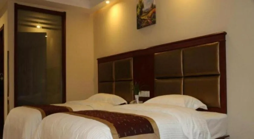 Bed in GreenTree Inn Taizhou New District Hospital of Renmin Hospital Mingliu Express Hotel