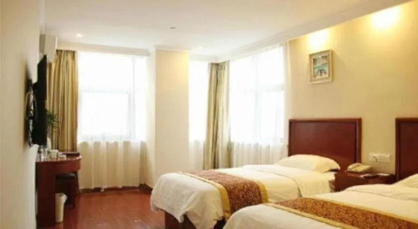 Bed in GreenTree Inn Taizhou New District Hospital of Renmin Hospital Mingliu Express Hotel