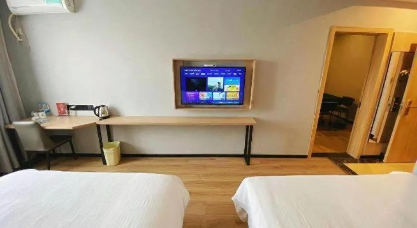 Bed in GreenTree Inn Taizhou New District Hospital of Renmin Hospital Mingliu Express Hotel