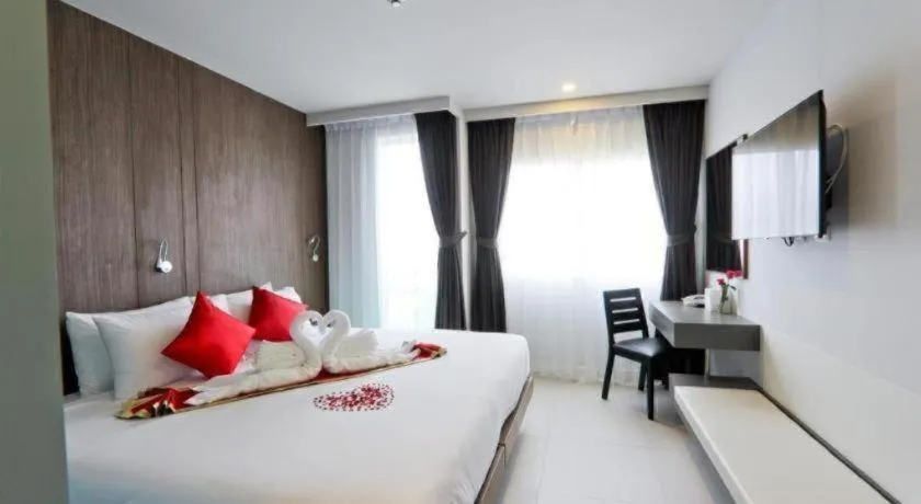 Bed in Elegancy Sansabai Hotel