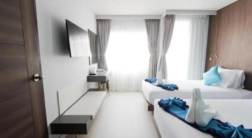 Bed in Elegancy Sansabai Hotel