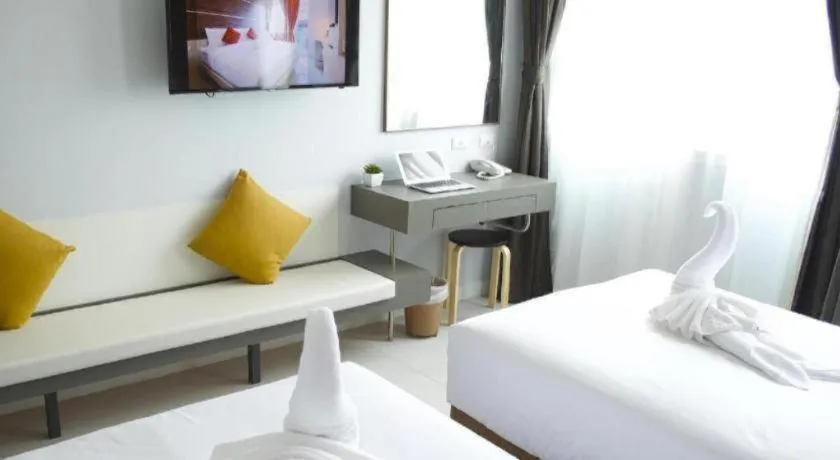 Bed in Elegancy Sansabai Hotel