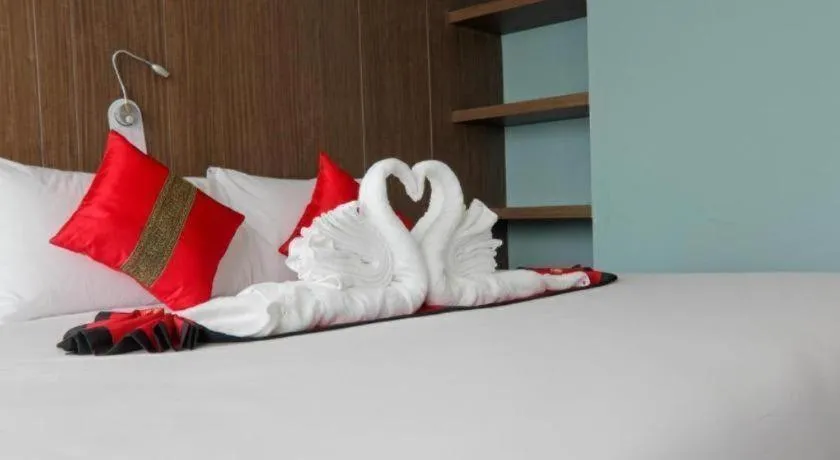 Bed in Elegancy Sansabai Hotel