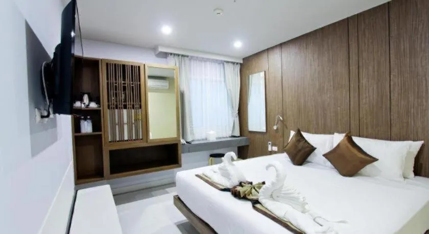 Bed in Elegancy Sansabai Hotel