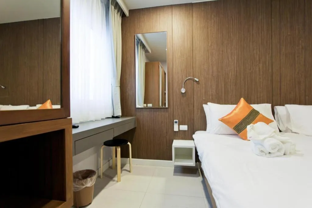 Bed in Elegancy Sansabai Hotel