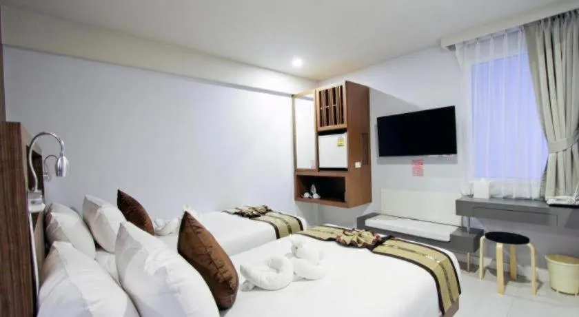 Bed in Elegancy Sansabai Hotel