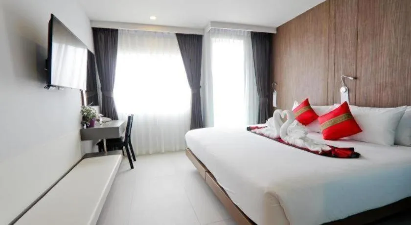 Bed in Elegancy Sansabai Hotel