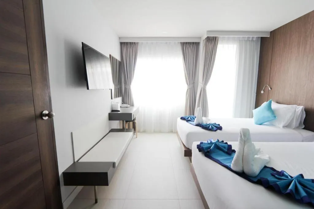 Bed in Elegancy Sansabai Hotel