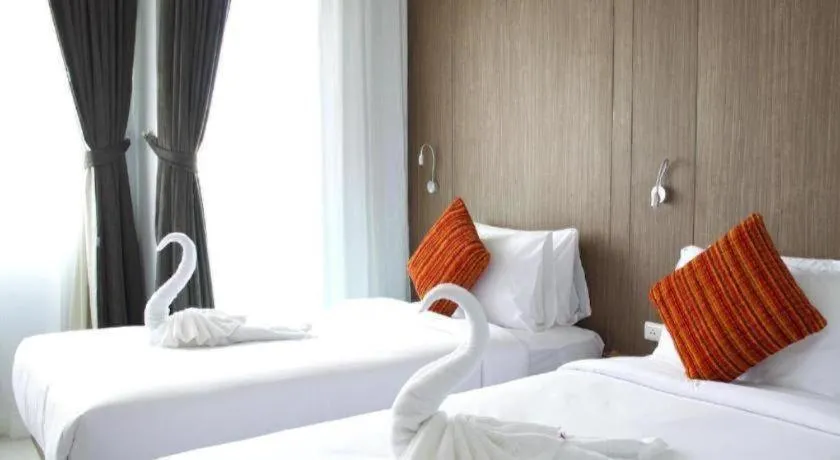 Bed in Elegancy Sansabai Hotel