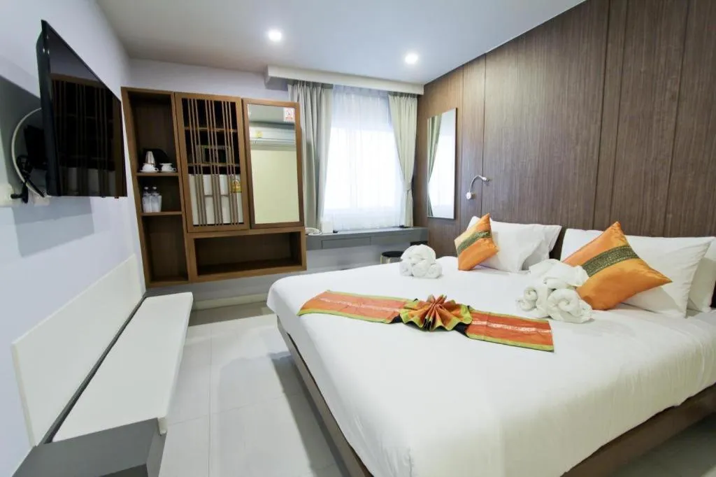 Bed in Elegancy Sansabai Hotel