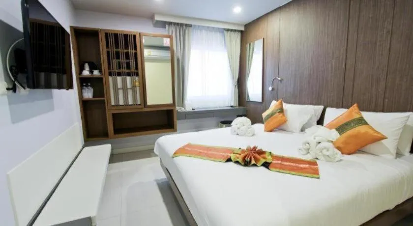 Bed in Elegancy Sansabai Hotel