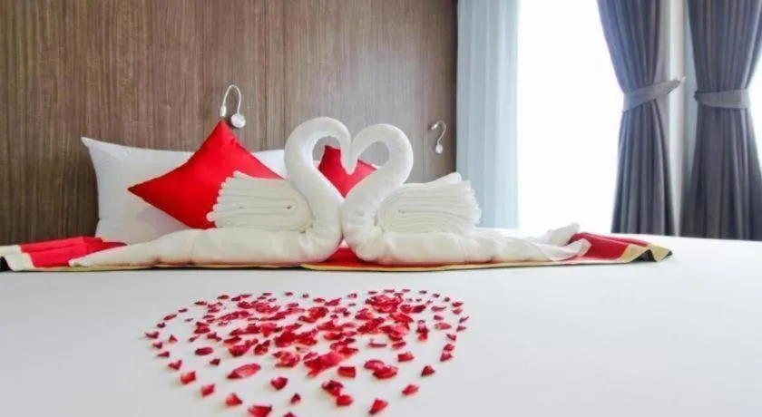 Bed in Elegancy Sansabai Hotel