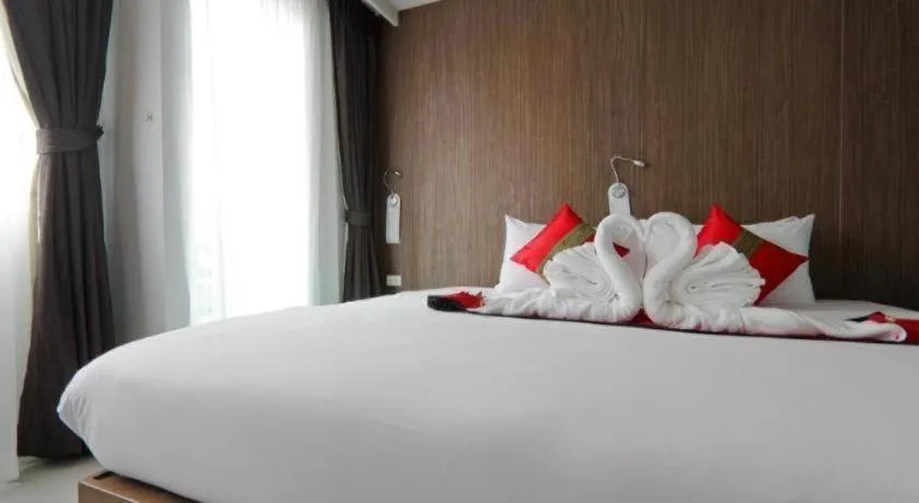 Bed in Elegancy Sansabai Hotel