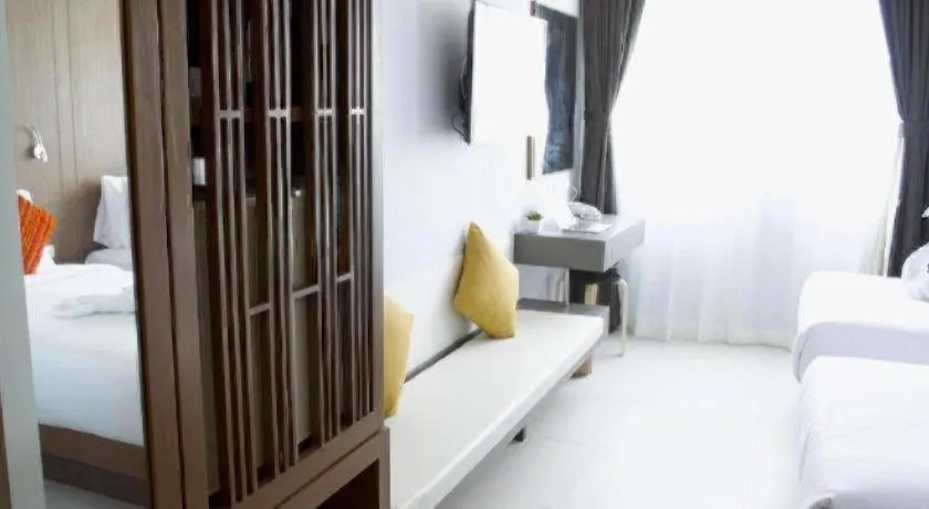 Bed in Elegancy Sansabai Hotel