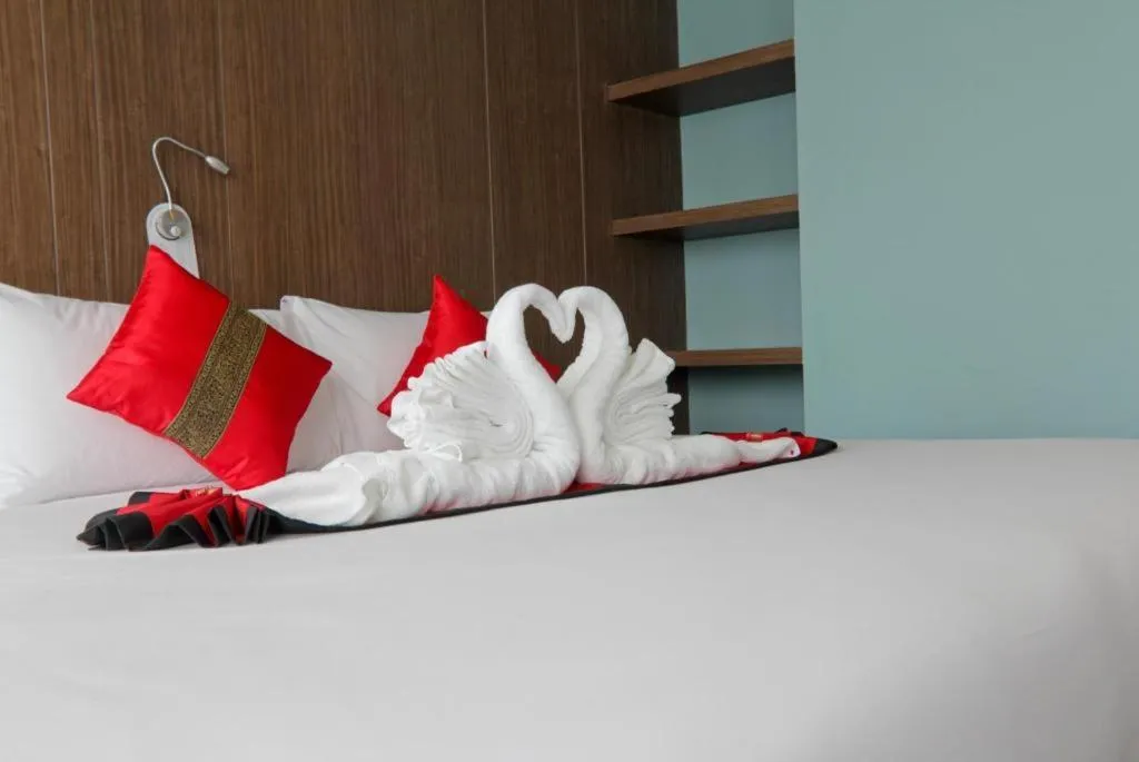 Bed in Elegancy Sansabai Hotel