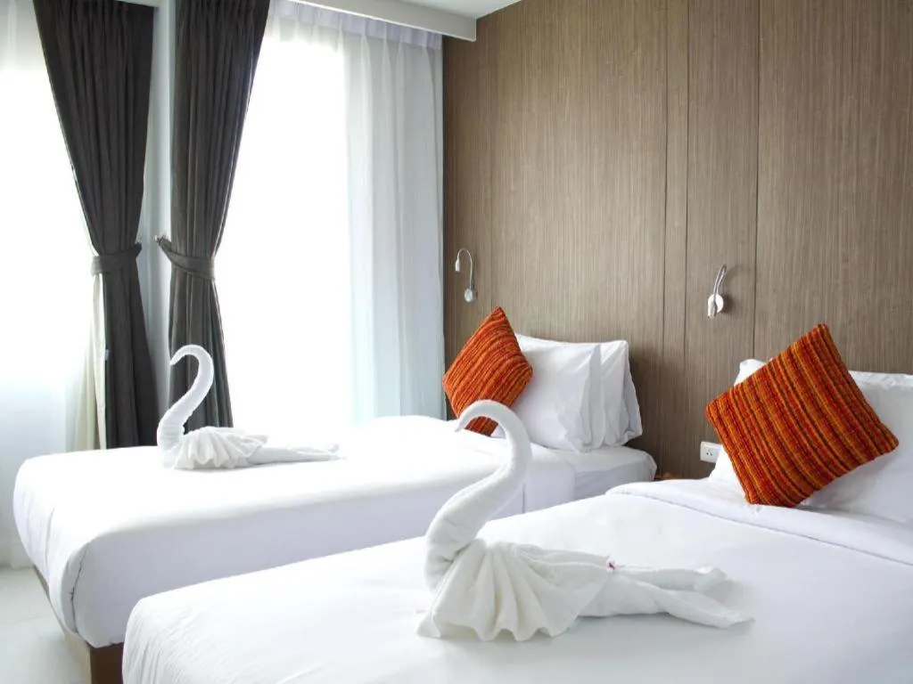 Bed in Elegancy Sansabai Hotel