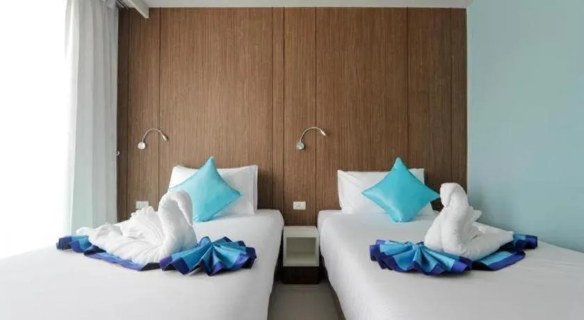 Bed in Elegancy Sansabai Hotel