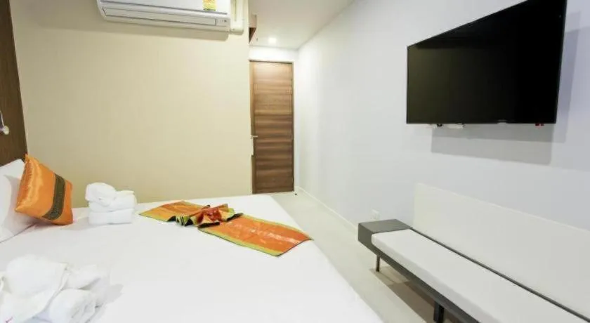 Bed in Elegancy Sansabai Hotel