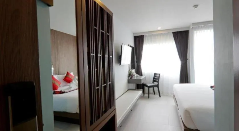 Bed in Elegancy Sansabai Hotel