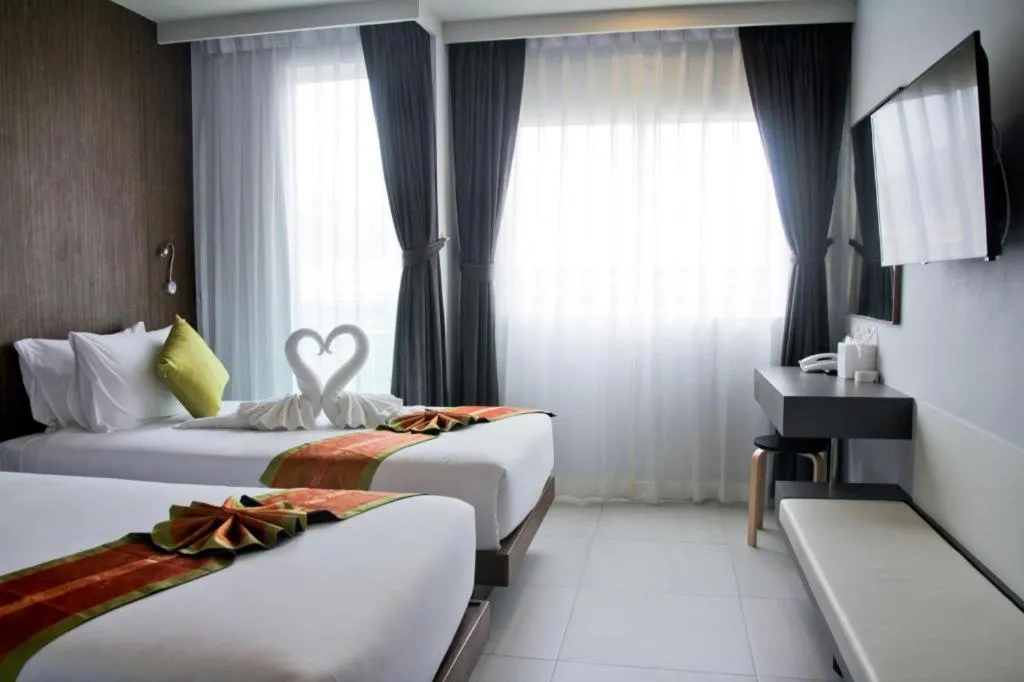 Bed in Elegancy Sansabai Hotel