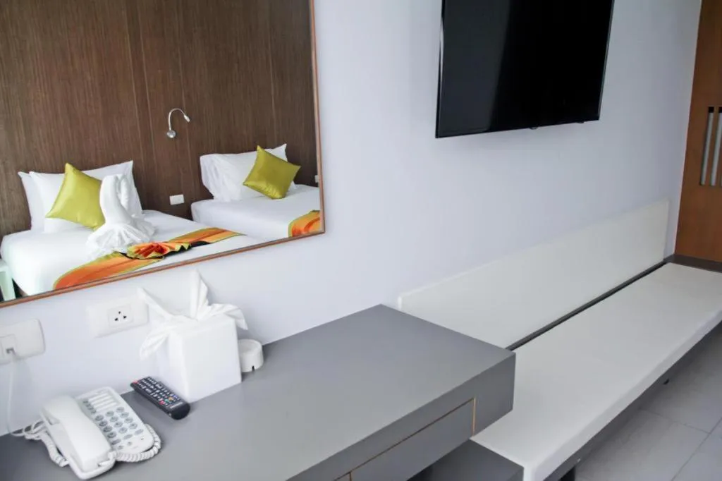 Bed in Elegancy Sansabai Hotel