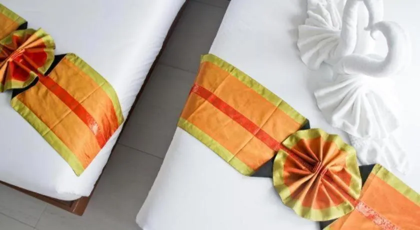 Bed in Elegancy Sansabai Hotel