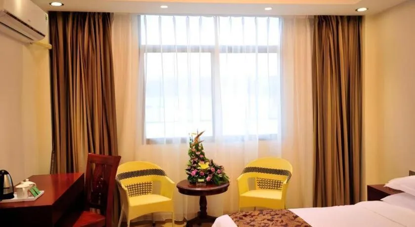 Bed in Jian Guo Grand Hotel