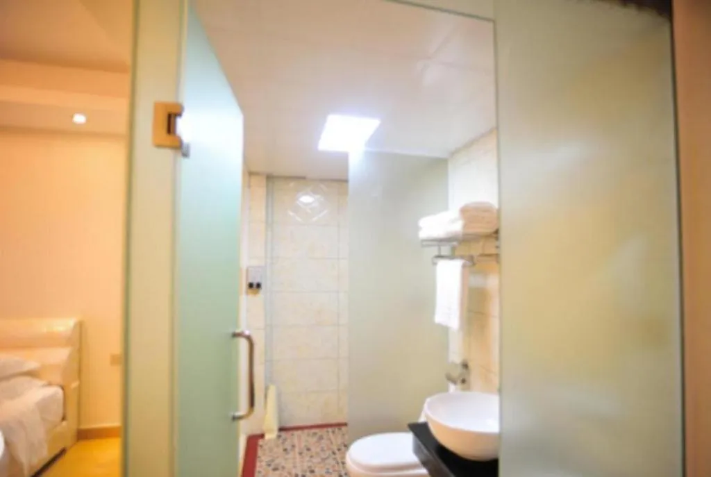 Bed in Jian Guo Grand Hotel