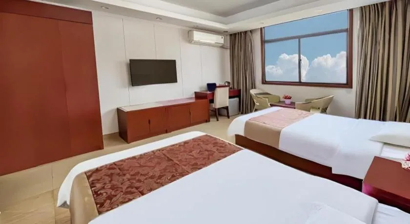 Bed in Jian Guo Grand Hotel