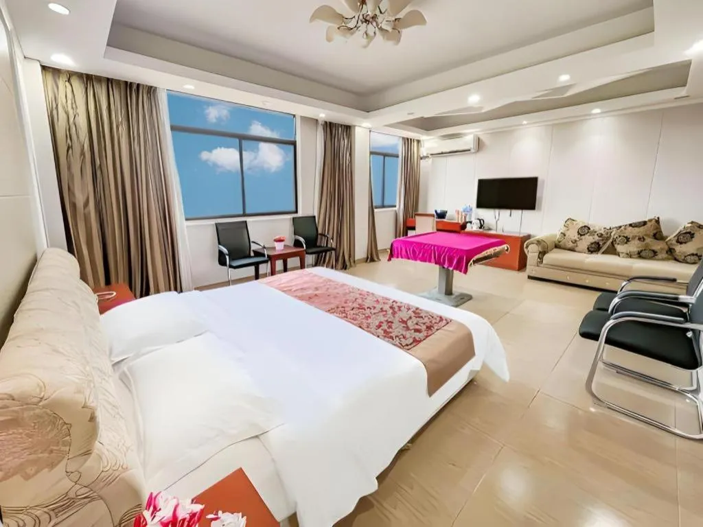 Bed in Jian Guo Grand Hotel