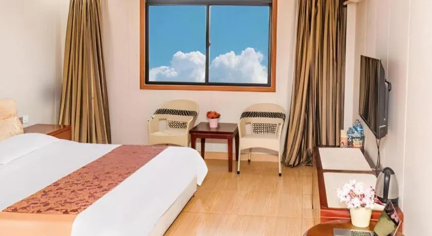 Bed in Jian Guo Grand Hotel