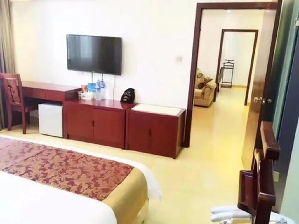 Bed in Jian Guo Grand Hotel