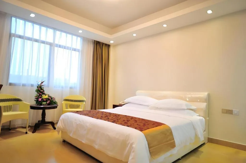 Bed in Jian Guo Grand Hotel