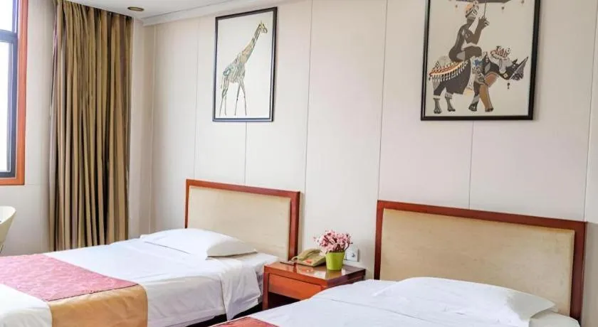 Bed in Jian Guo Grand Hotel