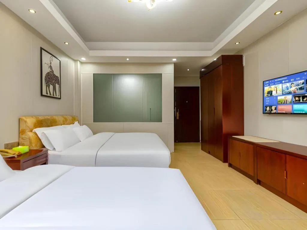 Bed in Jian Guo Grand Hotel