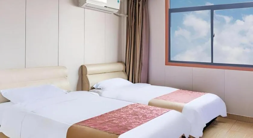 Bed in Jian Guo Grand Hotel