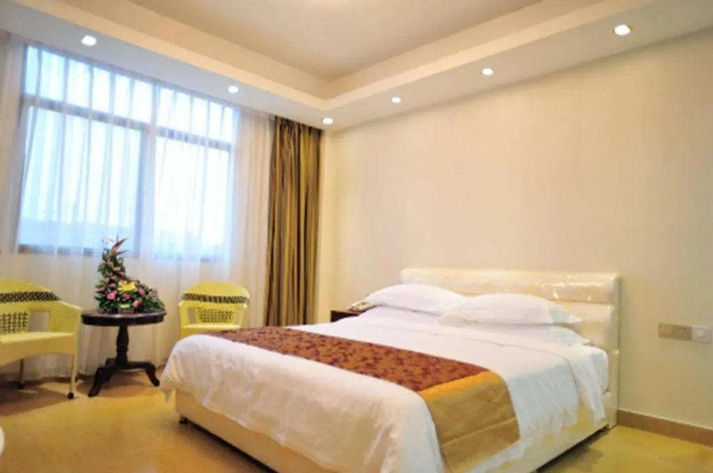 Bed in Jian Guo Grand Hotel