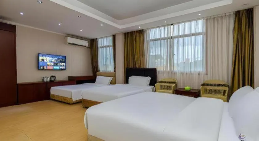 Bed in Jian Guo Grand Hotel