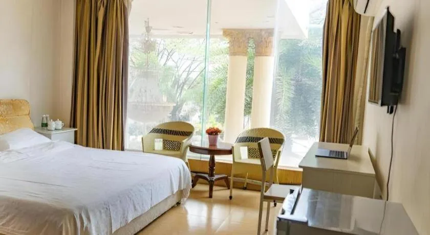 Bed in Jian Guo Grand Hotel