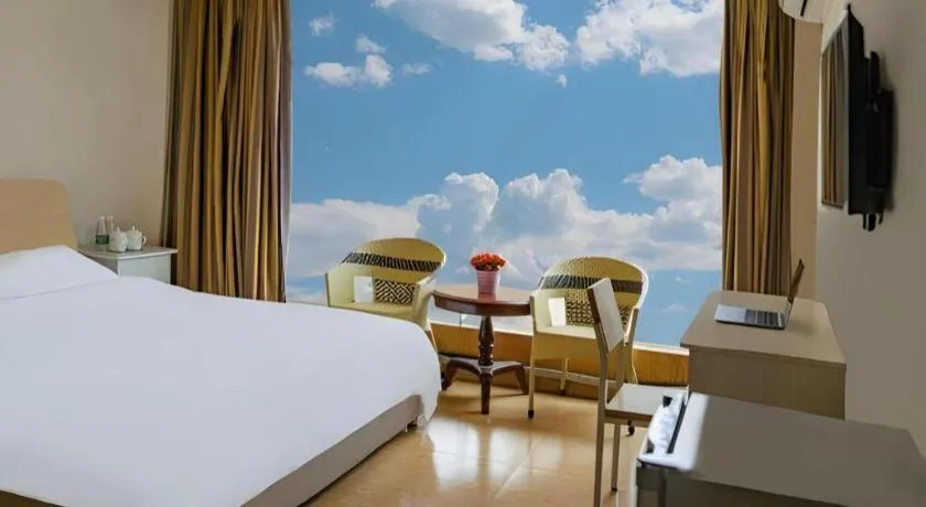 Bed in Jian Guo Grand Hotel