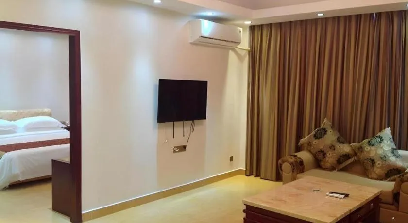 Bed in Jian Guo Grand Hotel