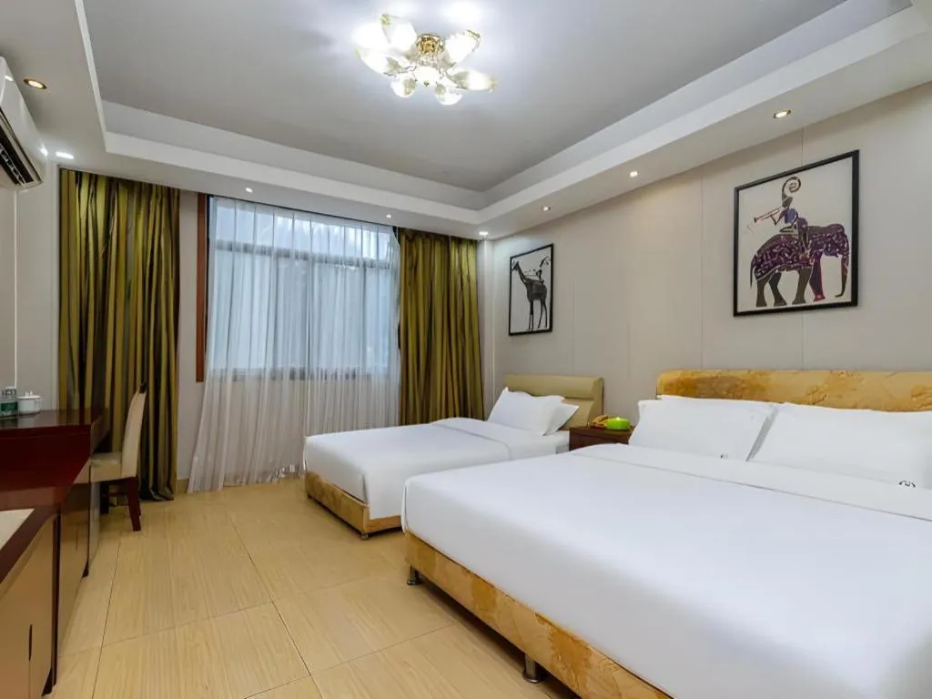 Bed in Jian Guo Grand Hotel