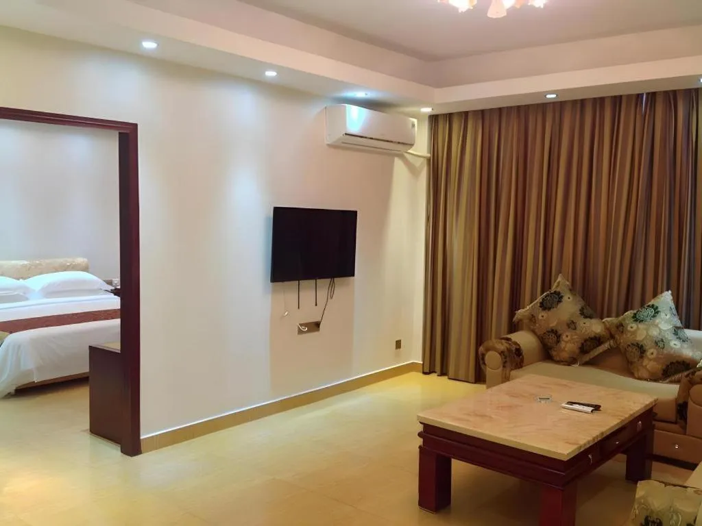 Bed in Jian Guo Grand Hotel