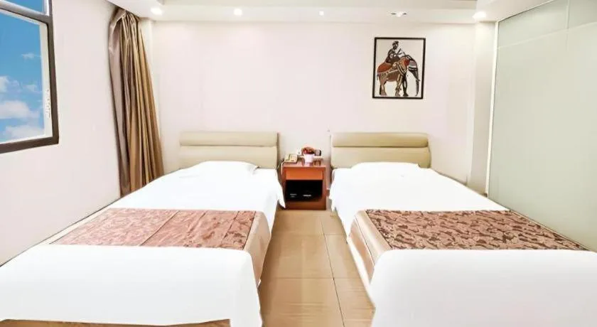 Bed in Jian Guo Grand Hotel