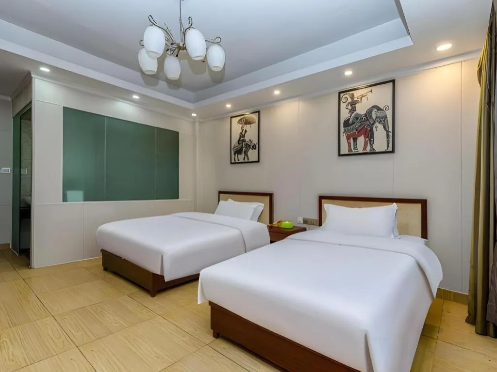 Bed in Jian Guo Grand Hotel