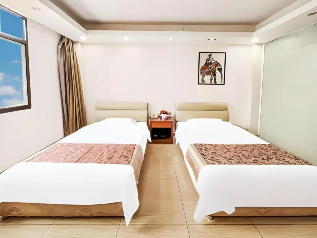 Bed in Jian Guo Grand Hotel