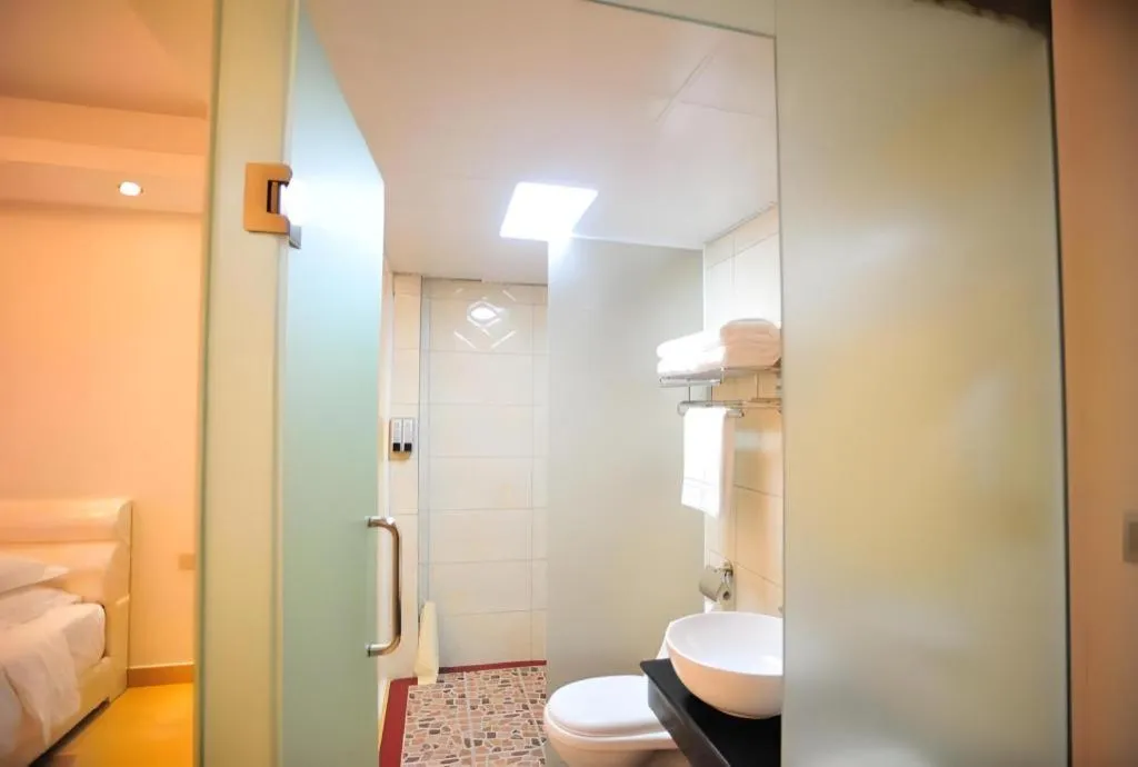 Bed in Jian Guo Grand Hotel